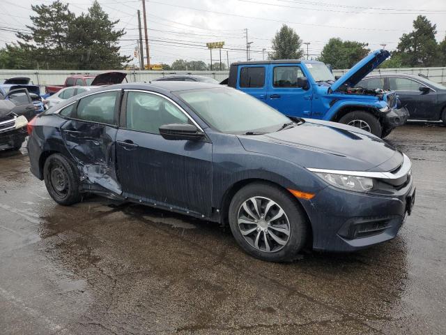 Photo 4 from auction – 2018 HONDA CIVIC LX with VIN 19XFC2F56JE044268