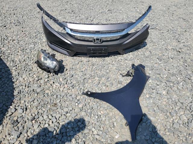 Photo 12 from auction – 2017 HONDA CIVIC EX with VIN 19XFC2F74HE022748