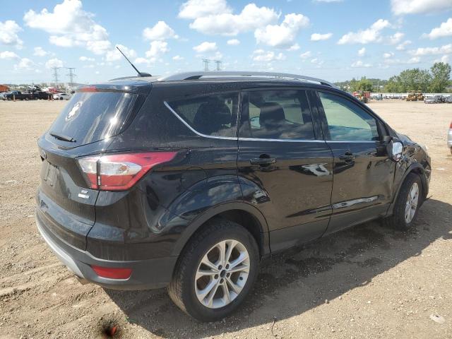 Photo 3 from auction – 2017 FORD ESCAPE SE with VIN 1FMCU9GD4HUD07072