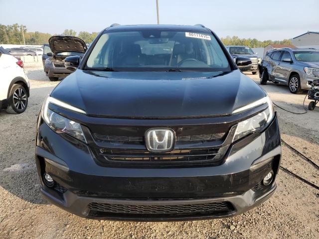 Photo 5 from auction – 2021 HONDA PILOT SE with VIN 5FNYF6H27MB001194