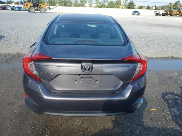 Photo 6 from auction – 2018 HONDA CIVIC LX with VIN 19XFC2F52JE003913