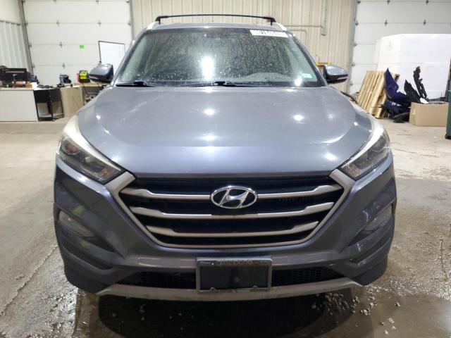 Photo 5 from auction – 2017 HYUNDAI TUCSON LIM with VIN KM8J3CA20HU266860