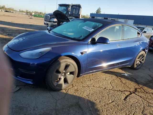 TESLA MODEL 3 2022 with VIN 5YJ3E1EB9NF323891 - Photo from auction
