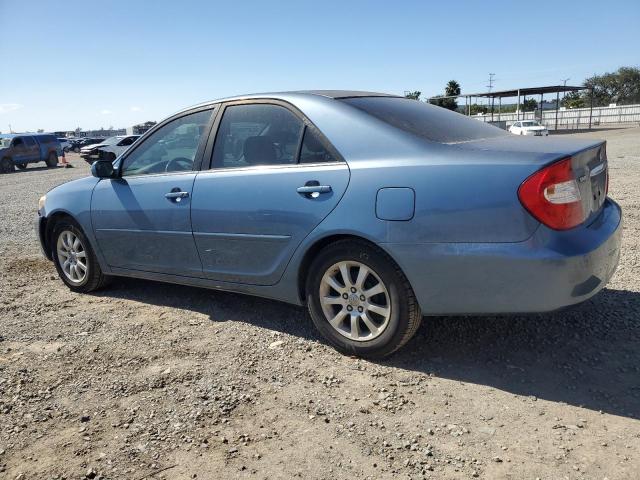 Photo 2 from auction – 2002 TOYOTA CAMRY LE with VIN JTDBE30KX20126401