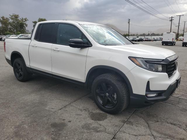 Photo 4 from auction – 2023 HONDA RIDGELINE with VIN 5FPYK3F87PB000494