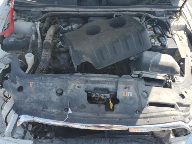 Photo 11 from auction – 2014 FORD TAURUS SE with VIN 1FAHP2D95EG179224