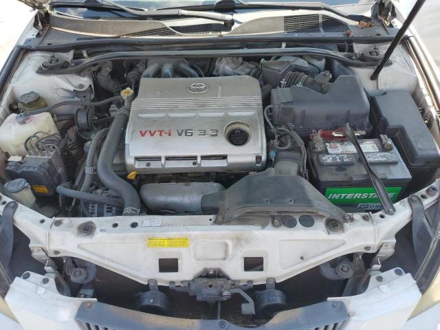Photo 11 from auction – 2004 TOYOTA CAMRY SOLARA SE with VIN 4T1CA30P94U014532