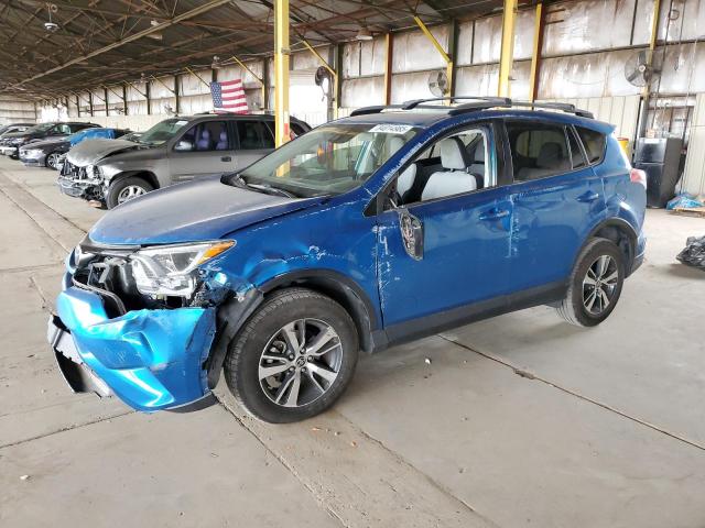 TOYOTA RAV4 XLE 2017 with VIN JTMWFREV3HJ114064 - Photo from auction