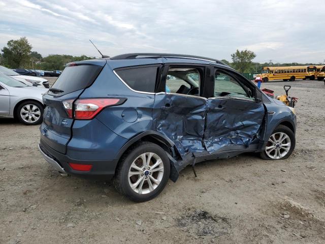 Photo 3 from auction – 2018 FORD ESCAPE SE with VIN 1FMCU9GD9JUA08098