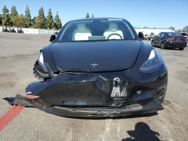 Photo 5 from auction – 2021 TESLA MODEL 3 with VIN 5YJ3E1EA0MF100130