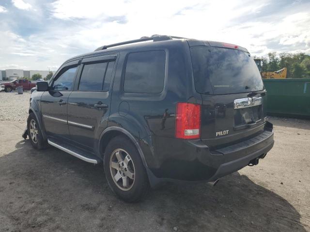 Photo 2 from auction – 2011 HONDA PILOT TOUR with VIN 5FNYF4H90BB004615