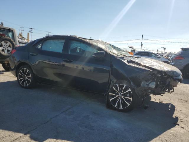 Photo 4 from auction – 2017 TOYOTA COROLLA L with VIN 5YFBURHE6HP648879