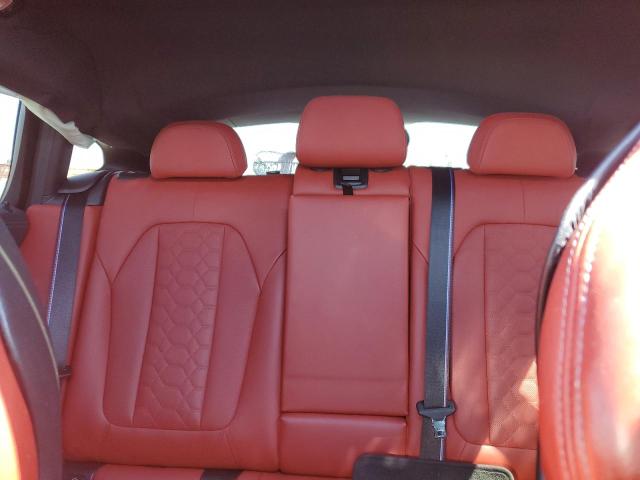Photo 10 from auction – 2023 BMW X4 M with VIN 5YM23EC05P9P13241