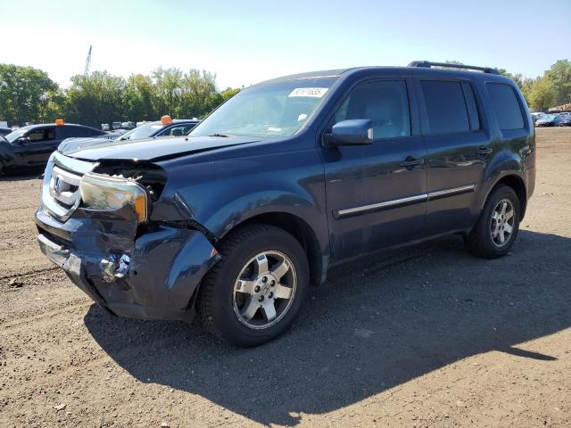 HONDA PILOT TOURING 2011 con VIN 5FNYF4H91BB103461 - Foto de la subasta