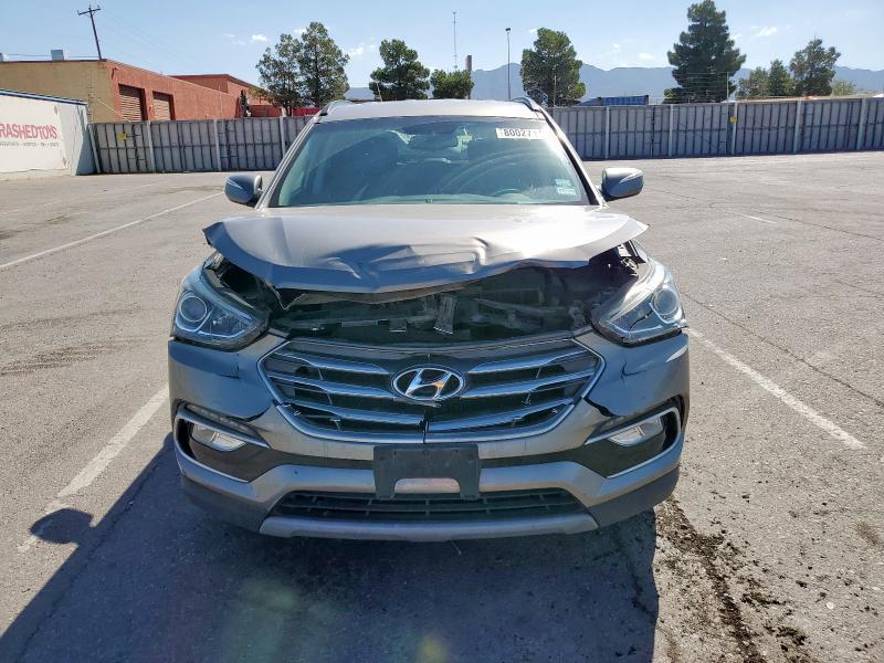 Photo 5 from auction – 2018 HYUNDAI SANTA FE S with VIN 5NMZU3LB2JH101312