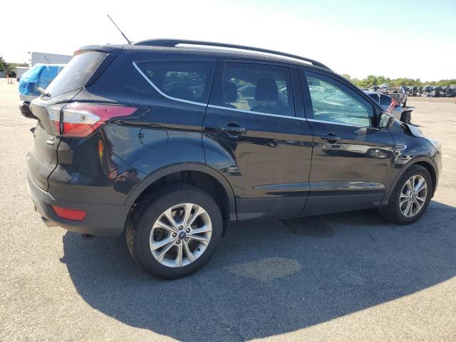 Photo 3 from auction – 2017 FORD ESCAPE SE with VIN 1FMCU9G97HUD33645