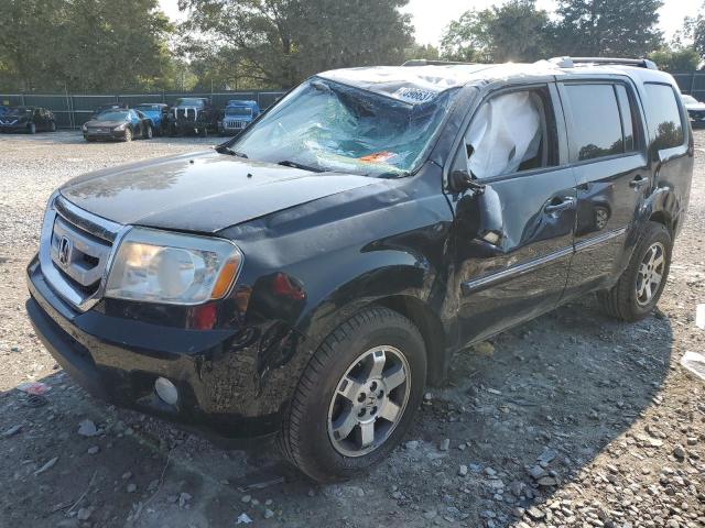 HONDA PILOT TOUR 2011 with VIN 5FNYF4H95BB016369 - Photo from auction