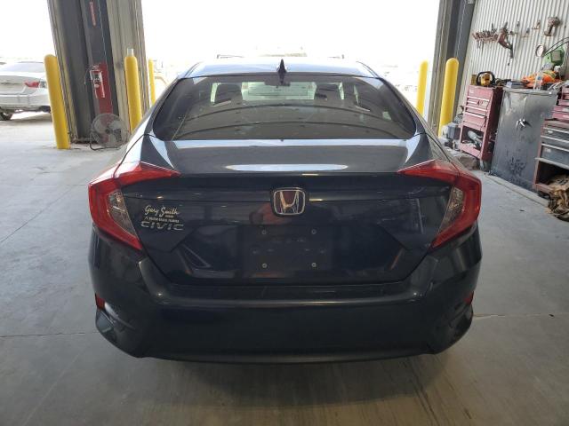 Photo 6 from auction – 2018 HONDA CIVIC EX with VIN 19XFC2F79JE006065