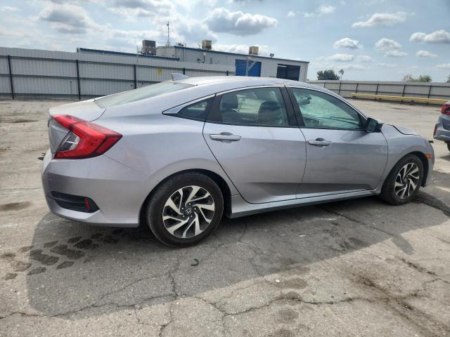 Photo 3 from auction – 2018 HONDA CIVIC EX with VIN 2HGFC2F75JH521019