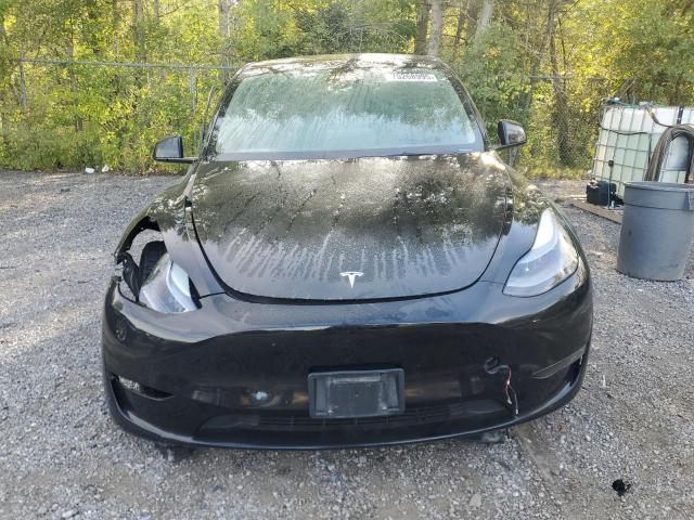 Photo 5 from auction – 2023 TESLA MODEL Y with VIN LRWYGDEE3PC105227