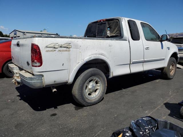 Photo 3 from auction – 1999 FORD F150 with VIN 1FTRX18L5XKA14157