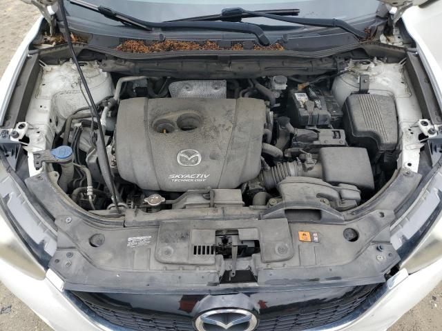 Photo 12 from auction – 2014 MAZDA CX-5 GT with VIN JM3KE2DY7E0427244