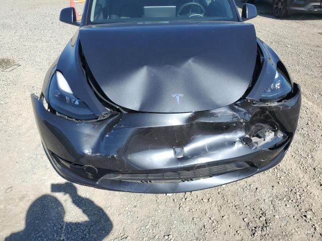 Photo 12 from auction – 2024 TESLA MODEL Y with VIN 7SAYGAEE8RF033273