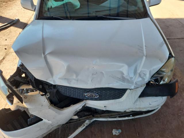 Photo 11 from auction – 2007 KIA RIO BASE with VIN KNADE123576217161