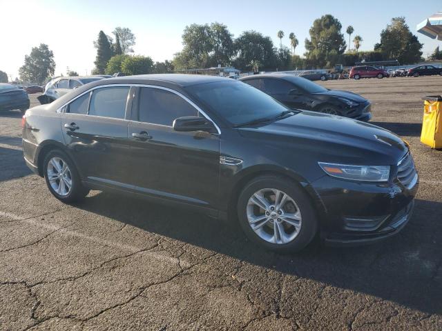 Photo 4 from auction – 2014 FORD TAURUS SEL with VIN 1FAHP2H84EG179054