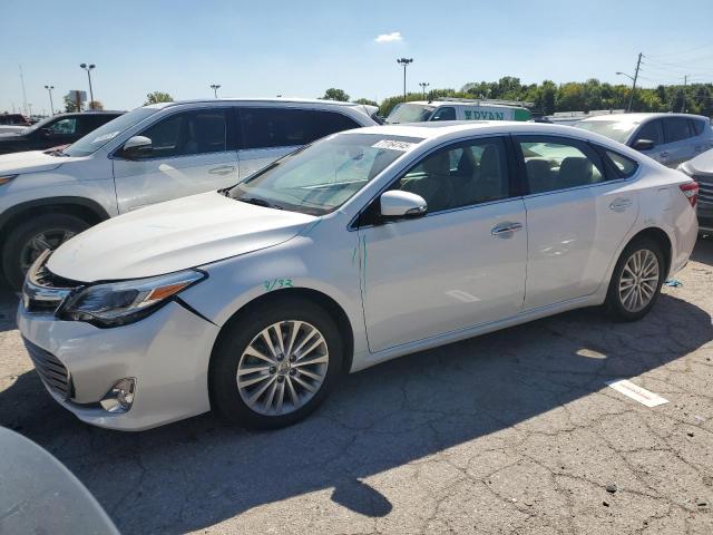 TOYOTA AVALON HYB 2014 with VIN 4T1BD1EB4EU024648 - Photo from auction
