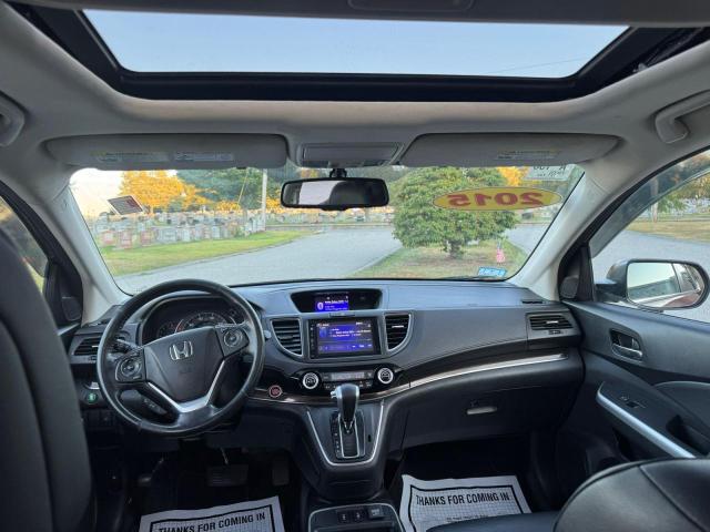 Photo 9 from auction – 2015 HONDA CR-V EXL with VIN 2HKRM4H76FH682317