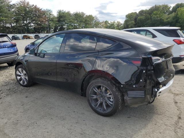 Photo 2 from auction – 2023 TESLA MODEL Y with VIN 7SAYGDEE7PA189588