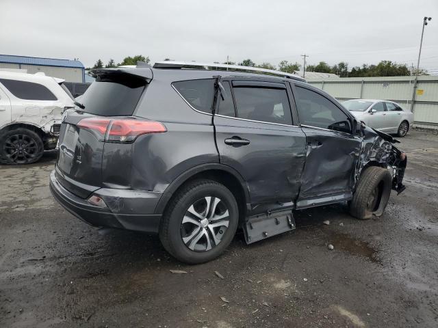 Photo 3 from auction – 2016 TOYOTA RAV4 LE with VIN JTMBFREV8GD184459