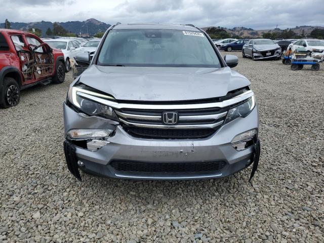 Photo 5 from auction – 2016 HONDA PILOT ELIT with VIN 5FNYF6H06GB121720