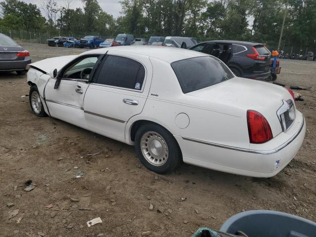 Photo 2 from auction – 2002 LINCOLN TOWN CAR E with VIN 1LNHM81W32Y642964
