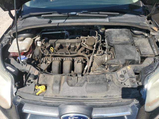 Photo 11 from auction – 2014 FORD FOCUS SE with VIN 1FADP3F2XEL435532