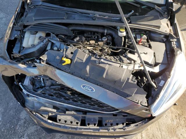 Foto 11 de la subasta – 2018 FORD FOCUS SE con VIN 1FADP3FE1JL299988