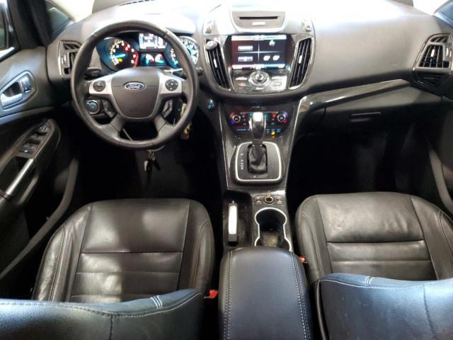 Photo 8 from auction – 2014 FORD ESCAPE TITANIUM with VIN 1FMCU9J9XEUB80313