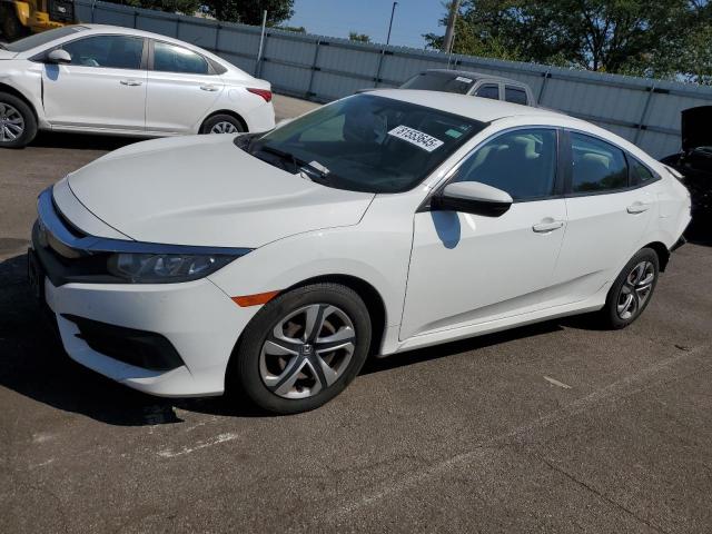 HONDA CIVIC LX 2017 with VIN 19XFC2F57HE063504 - Photo from auction