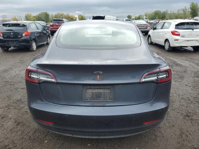 Photo 6 from auction – 2022 TESLA MODEL 3 with VIN 5YJ3E1EAXNF326032