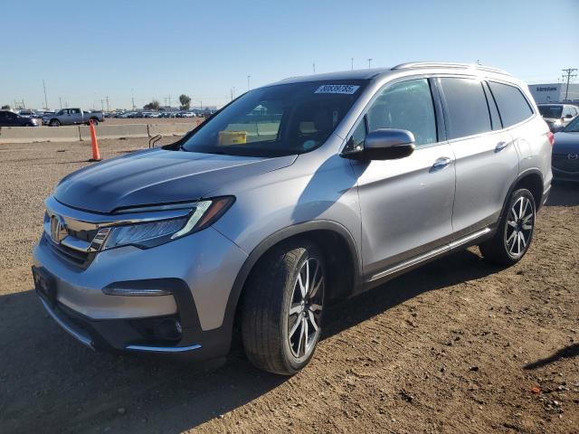HONDA PILOT TOURING 2021 with VIN 5FNYF6H67MB034473 - Photo from auction