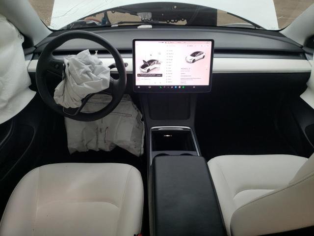 Photo 8 from auction – 2022 TESLA MODEL 3 with VIN 5YJ3E1EB3NF165029