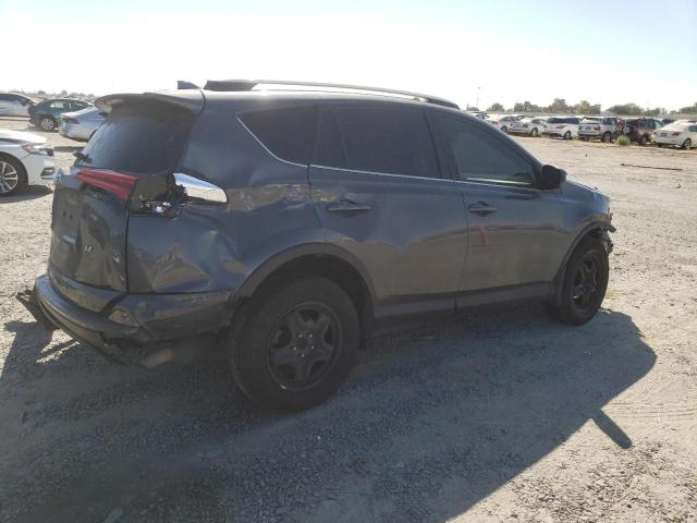Photo 3 from auction – 2017 TOYOTA RAV4 LE with VIN JTMZFREV5HJ131011
