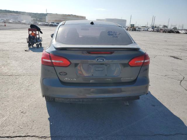 Photo 6 from auction – 2017 FORD FOCUS TITANIUM with VIN 1FADP3J28HL236927