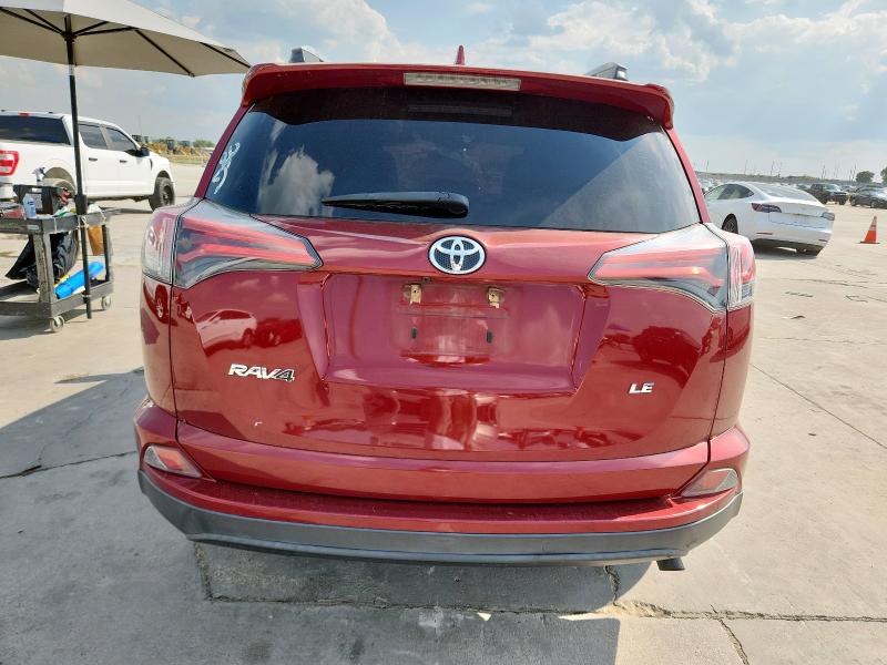 Photo 6 from auction – 2018 TOYOTA RAV4 LE with VIN 2T3ZFREV1JW451742