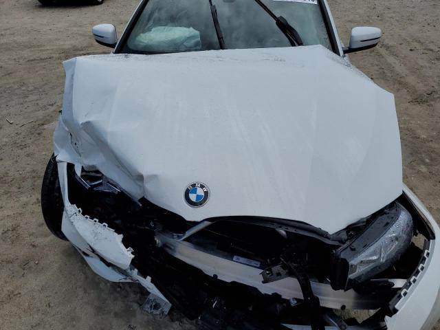 Photo 11 from auction – 2023 BMW 330I with VIN 3MW69FF0XP8D11071