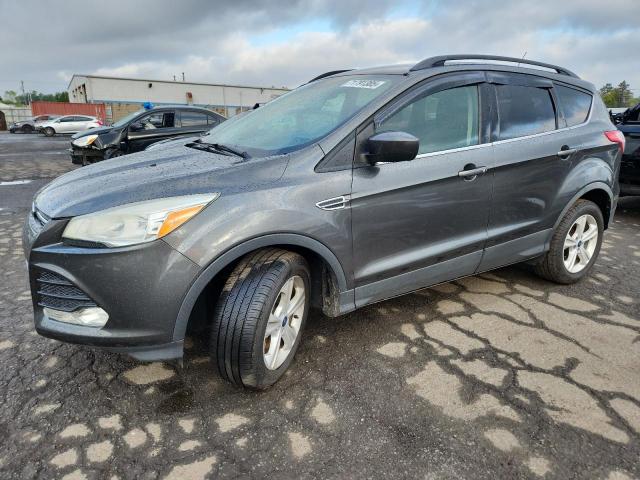FORD ESCAPE SE 2016 with VIN 1FMCU9G95GUC16533 - Photo from auction