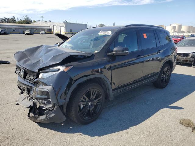 HONDA PILOT BLAC 2022 with VIN 5FNYF6H72NB055127 - Photo from auction