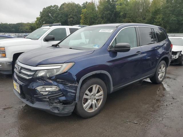 HONDA PILOT LX 2016 with VIN 5FNYF6H11GB090465 - Photo from auction