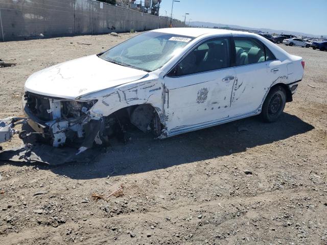 TOYOTA CAMRY HYBR 2014 with VIN 4T1BD1FK2EU105372 - Photo from auction